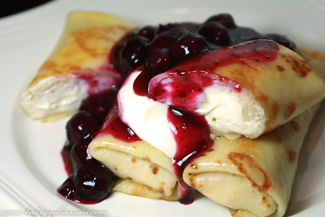 Curd Cheese Filled Crêpes with Blueberry Sauce (cut)