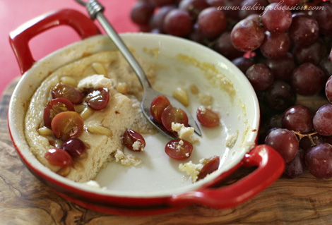 Sweet Ricotta Pudding with Roasted Grapes Inside Warm
