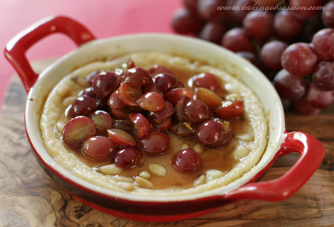 Sweet Ricotta Pudding with Roasted Grapes Warm